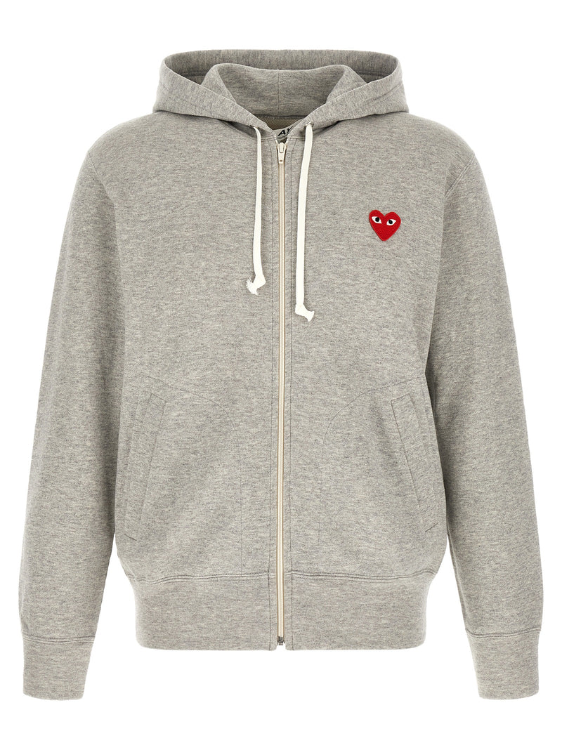 Comme Des Garçons Play Gray Cotton Hoodie for Men, a Comme Des Garçons Hoodie for Men with a front zip closure, drawstring hood, red PLAY heart patch, and welt pockets. Comme Des Garçons Play style in Gray, size options L, M, and XL, listed as New with tags and in-stock under 13879, 79680700467, Cardigans - Sweaters - Clothing, Clothing, Discount_30-39, Men, Sweaters - Clothing.