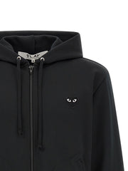Comme Des Garçons Sweatshirt for Men | Black PLAY Hoodie by Comme Des Garçons Play, close-up of the front zip, adjustable drawstrings, hood, and embroidered heart logo. Black sweater in Cardigans - Sweaters - Clothing and Sweaters - Clothing, listed under Clothing for Men in sizes L, M, XL, and XXL; New with tags, in-stock, Discount_30-39.