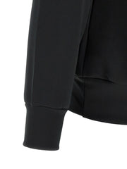Comme Des Garçons Sweatshirt for Men | Black PLAY Hoodie by Comme Des Garçons Play, close-up detail of the ribbed cuff, sleeve, and side pocket construction. Black sweater in Cardigans - Sweaters - Clothing and Sweaters - Clothing, listed under Clothing for Men in sizes L, M, XL, and XXL; New with tags, in-stock, Discount_30-39.