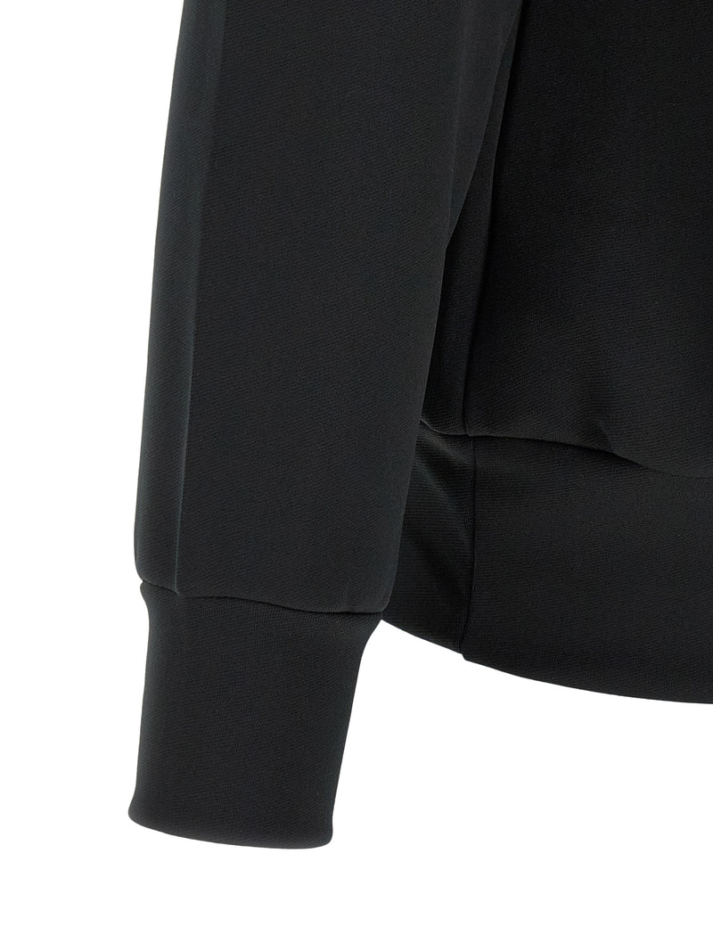 Comme Des Garçons Sweatshirt for Men | Black PLAY Hoodie by Comme Des Garçons Play, close-up detail of the ribbed cuff, sleeve, and side pocket construction. Black sweater in Cardigans - Sweaters - Clothing and Sweaters - Clothing, listed under Clothing for Men in sizes L, M, XL, and XXL; New with tags, in-stock, Discount_30-39.