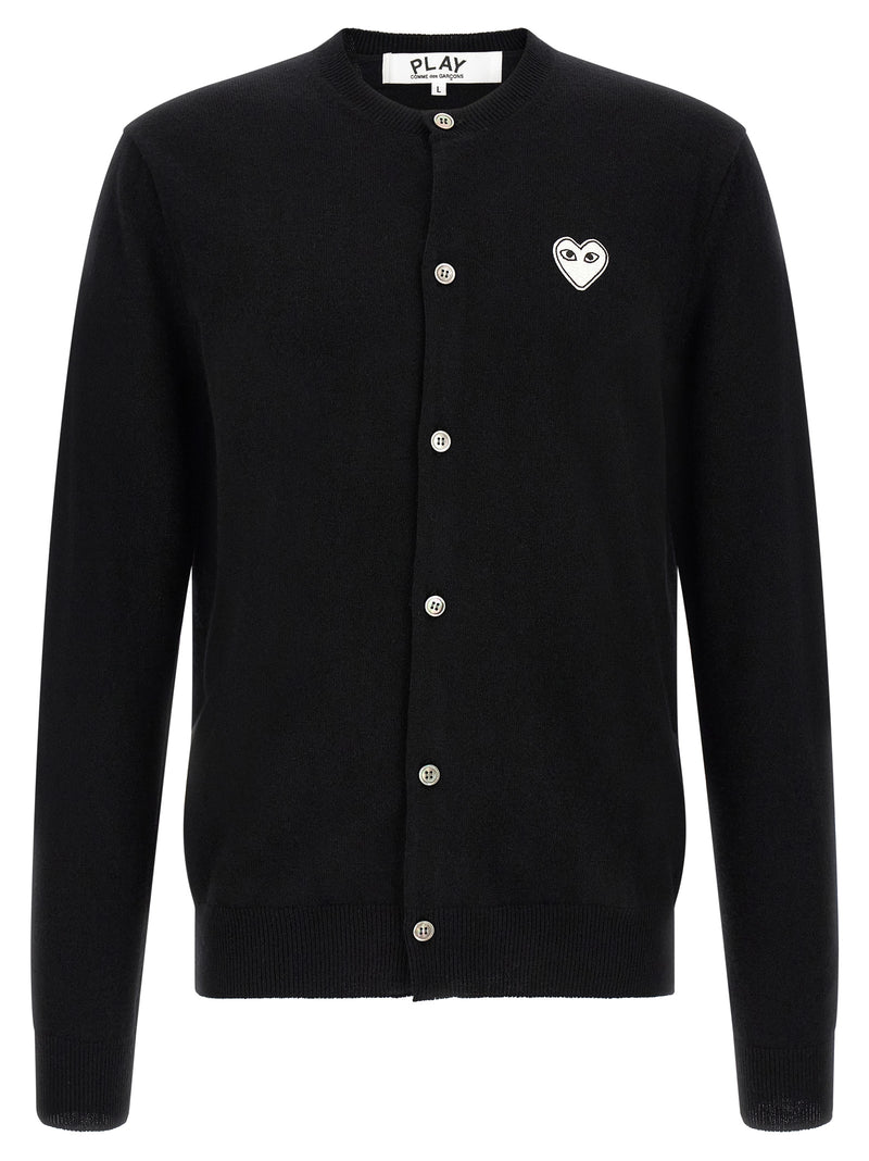 Comme Des Garçons Play Comme Des Garçons Play Black Wool Cardigan for Men, front view featuring the white heart logo, button closure, and ribbed trims. This Comme Des Garçons Cardigan for Men is Black and available as New with tags in size L for Men, listed under Cardigans - Sweaters - Clothing, Clothing, and Sweaters - Clothing; in-stock, Discount_30-39, 13879, 79680700467.