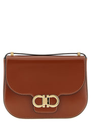 Ferragamo Double Gancini Leather Crossbody Bag for Women, a brown Ferragamo Crossbody Bag for Women with signature gold-tone Double Gancini closure, featured by Urbalenti NYC, 13879, 79680700467, Bags, Brown, Crossbody Bags - Bags, Discount_40-49, Ferragamo, in-stock, New with tags, Women.