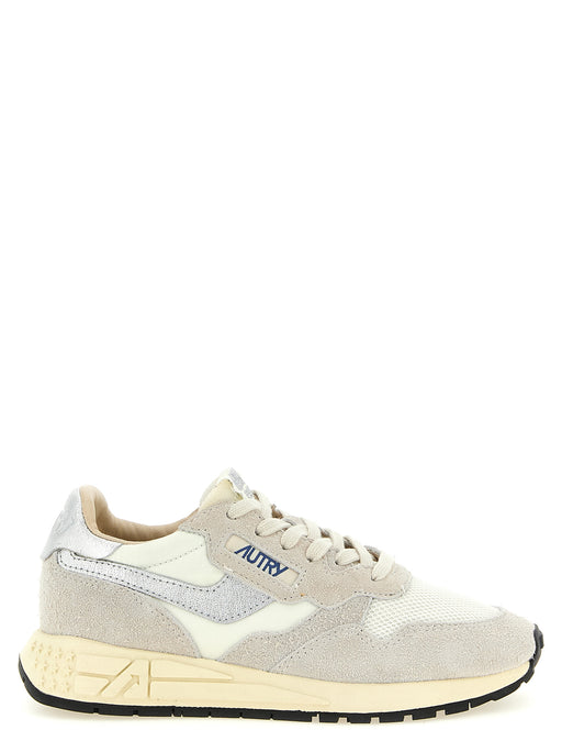 Autry White Cowhide Athletic Sneakers for Women, side view of white and sand Autry Sneakers for Women with suede, breathable mesh, metallic silver accents, and rubber tread. Available from Urbalenti NYC, item 13879, style 79680700467, Athletic - Sneakers - Shoes, Autry, Discount_30-39, EU36/US6, EU37/US7, EU38/US8, EU39/US9, EU40/US10, EU41/US11, in-stock, New with tags, Shoes, Sneakers - Shoes, White, Women.
