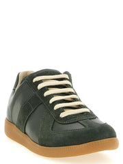 Maison Margiela Replica Bicolor Calfskin Low Top Sneakers shown from the front three-quarter view in forest green calfskin and suede with contrasting cream laces and honey-toned sole. Maison Margiela Replica Sneakers for Men from Urbalenti NYC, style 13879, product code 79680700467, Bicolor, Discount_30-39, EU 40 | US 7, EU 41 | US 8, EU43/US10, in-stock, Low Tops - Sneakers - Shoes, Maison Margiela, Men, New with tags, Shoes, Sneakers - Shoes.