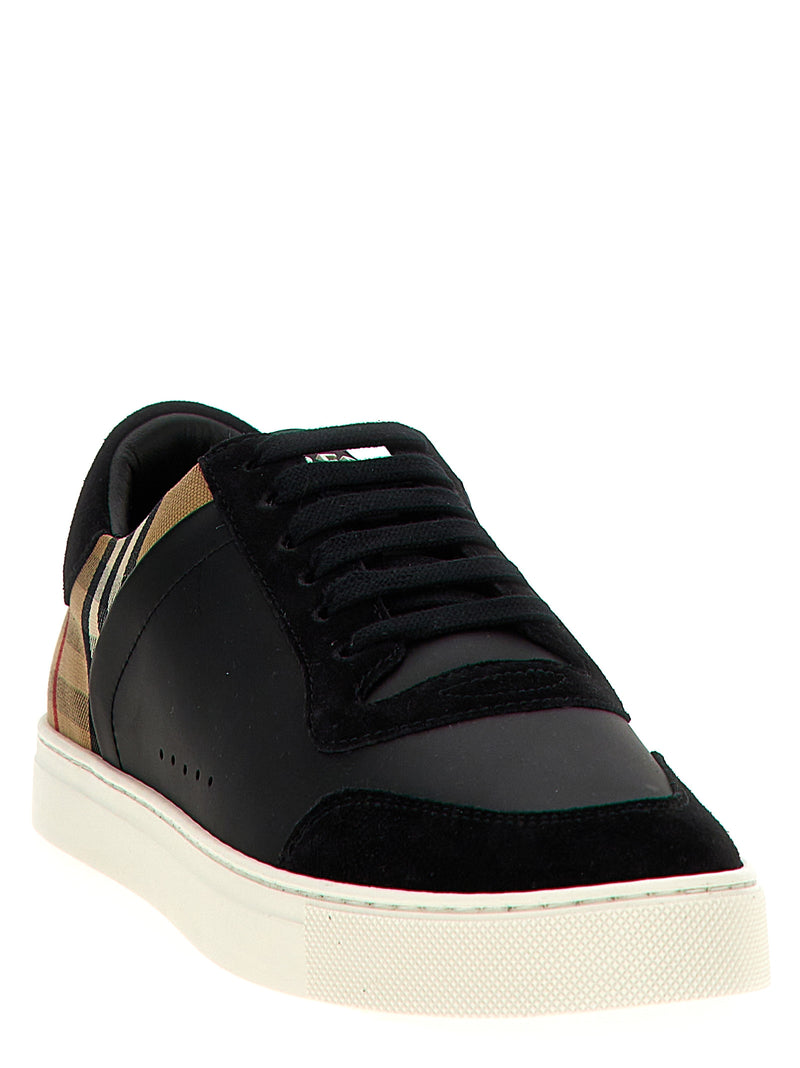 Front three-quarter view of Burberry Black Leather & Suede Low Top Sneakers for Men, Burberry Sneakers for Men featuring black leather and suede panels, signature check-print detail, padded collar, and durable rubber outsole. Urbalenti NYC, 13879, 79680700467, Black, Burberry, Discount_40-49, EU 41 | US 8, EU44/US11, in-stock, Low Tops - Sneakers - Shoes, Men, New with tags, Shoes, Sneakers - Shoes.