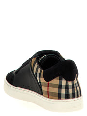Rear three-quarter view of Burberry Black Leather & Suede Low Top Sneakers for Men, Burberry Sneakers for Men showcasing the signature check-print heel, black suede collar, embossed Burberry sole, and white rubber outsole. Urbalenti NYC, 13879, 79680700467, Black, Burberry, Discount_40-49, EU 41 | US 8, EU44/US11, in-stock, Low Tops - Sneakers - Shoes, Men, New with tags, Shoes, Sneakers - Shoes.