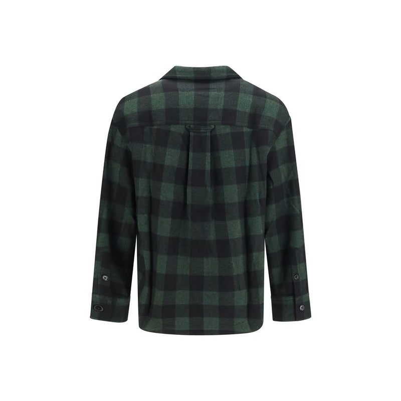 Back view of the AMI Paris Bicolor Merino Wool Check Shirt for Men with Chest Pockets, an AMI Paris Shirt for Men crafted from merino wool with long sleeves and cuff details, featured as an AMI Paris Shirt for Men at Urbalenti NYC.