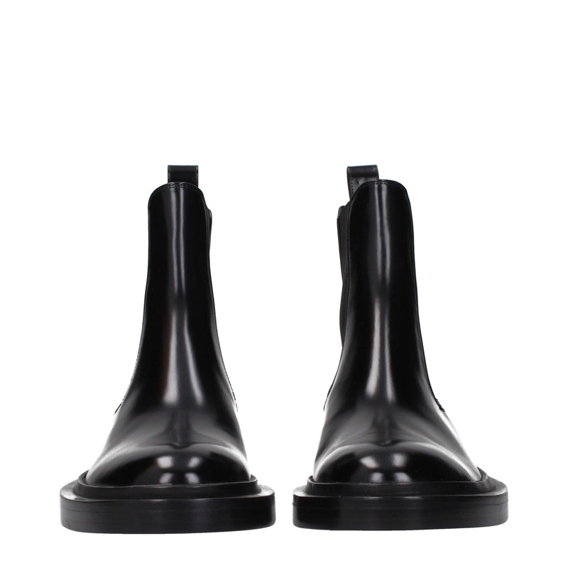 Botas de cano curto de couro preto Jil Sander