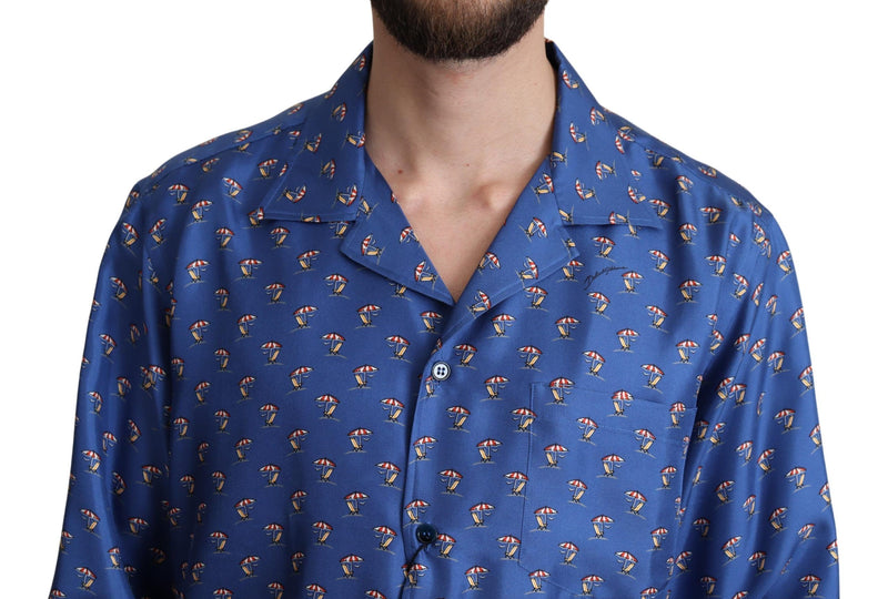 Camicia in seta blu con stampa di sedie a sdraio e ombrelloni Dolce & Gabbana