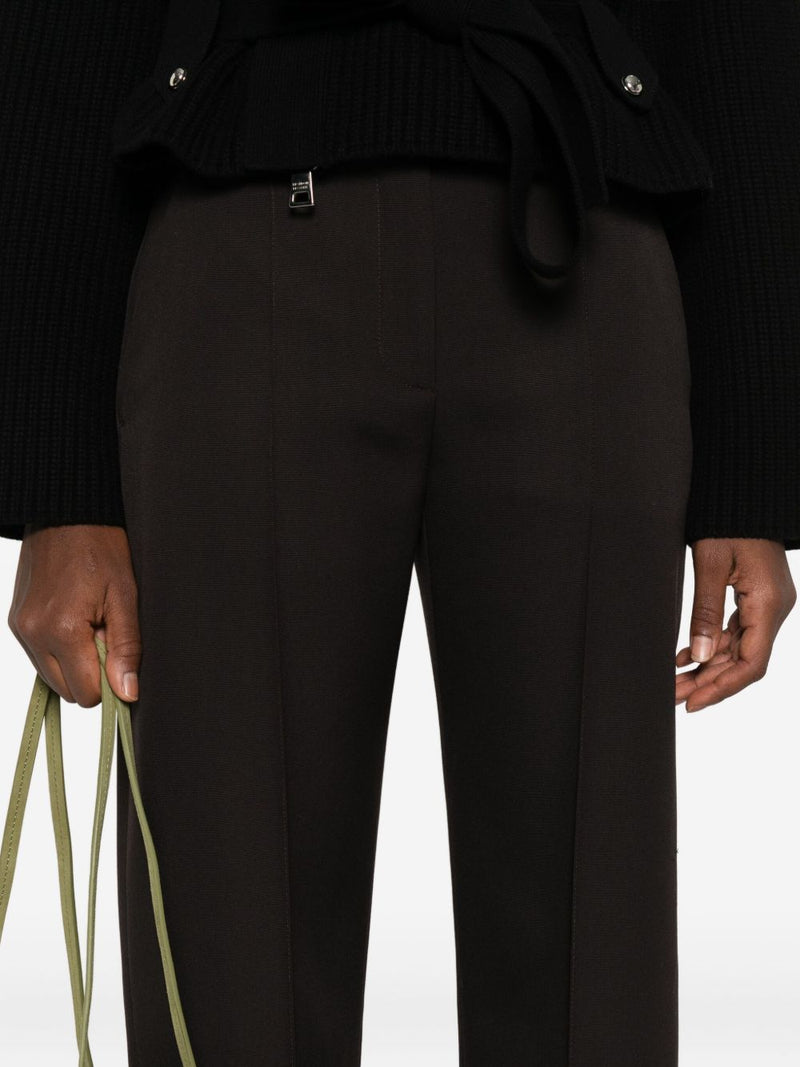 Alexander McQueen Pressed-crease tailored trousers | U... | Urbalenti™ NYC