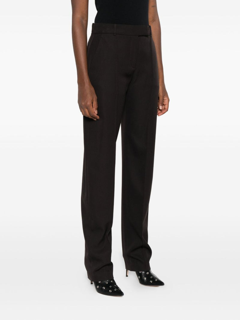 Alexander McQueen Pressed-crease tailored trousers | U... | Urbalenti™ NYC