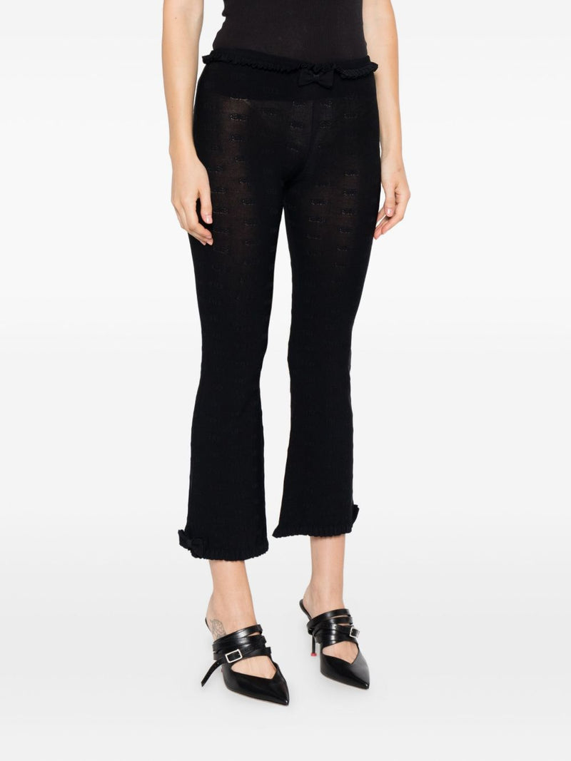 Pantalones acampanados Balenciaga con volantes | URBALENTI™