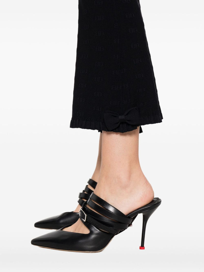 Pantalones acampanados Balenciaga con volantes | URBALENTI™