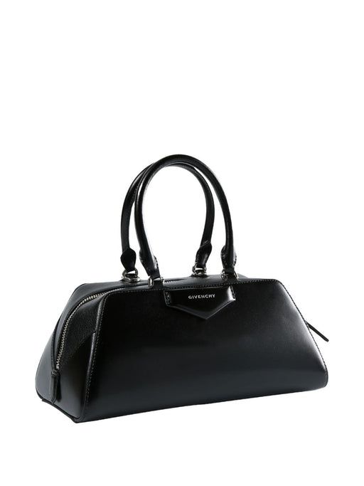Chic Givenchy Small Antigona East-West Designer Bag showcased in a versatile black finish, designed for the woman on-the-go. This bag is in-stock and perfect for Fall - Winter 2025. Elevate your style with these extraordinary Designer Bags from Urbalenti™ NYC. Women > Bags > Handbag, Yes Eu, Givenchy Small Antigona East-West Designer Bags.