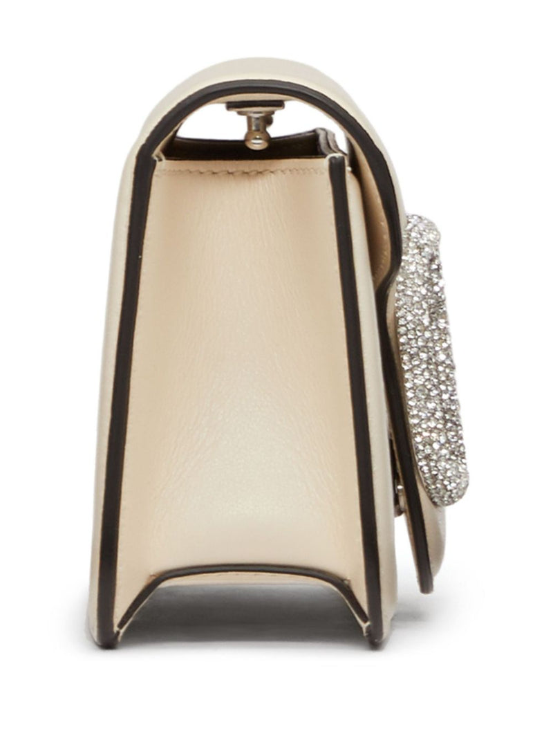 Valentino Garavani small Locò crystal-embellished shoulder bag - Leather... | Urbalenti™ NYC
