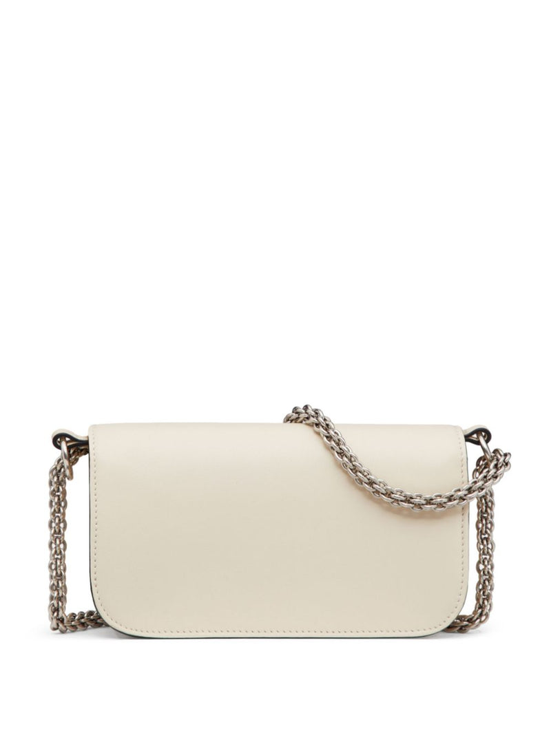 Valentino Garavani small Locò crystal-embellished shoulder bag - Leather... | Urbalenti™ NYC