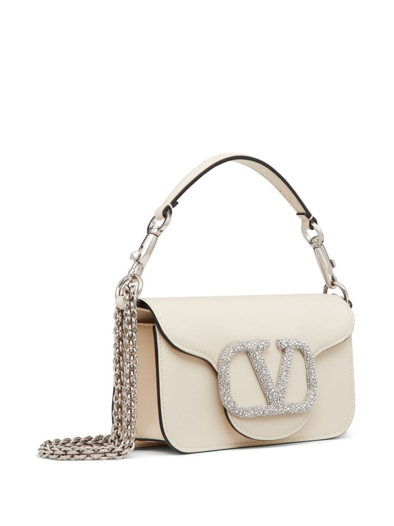 Valentino Garavani small Locò crystal-embellished shoulder bag - Leather... | Urbalenti™ NYC
