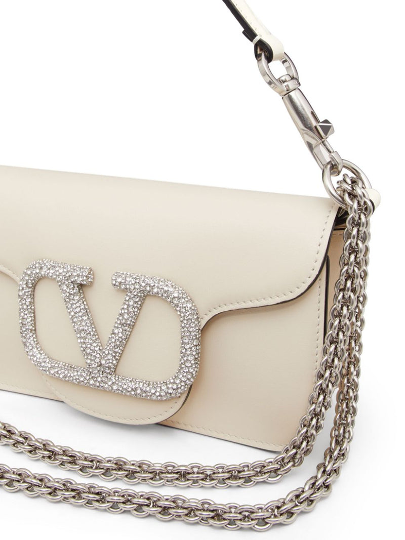 Valentino Garavani small Locò crystal-embellished shoulder bag - Leather... | Urbalenti™ NYC