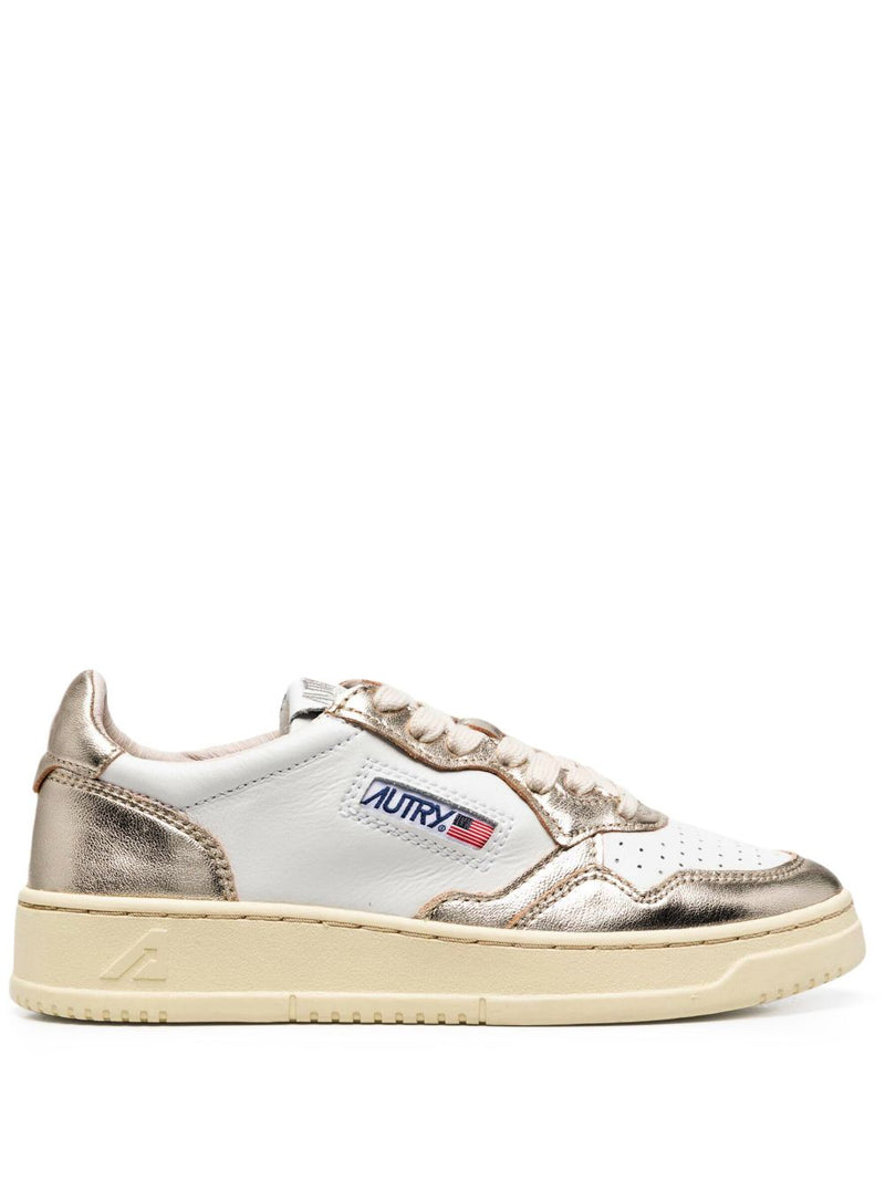 Autry MEDALIST LOW BICOLOR SNEAKERS IN WHITE AND PLATINUM METALLIC LEATHER | Urbalenti™ NYC