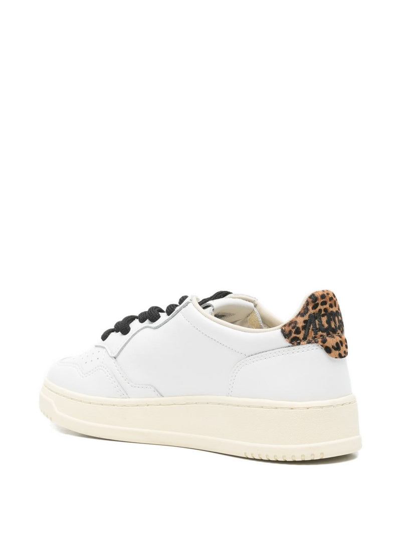 Autry Medalist Low Leather Sneakers in color white and leopard | Urbalenti™ NYC