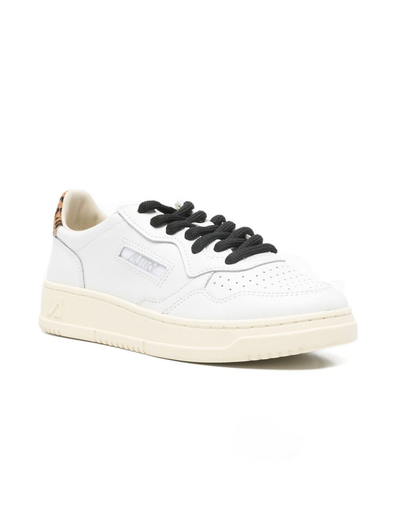 Autry Medalist Low Leather Sneakers in color white and leopard | Urbalenti™ NYC