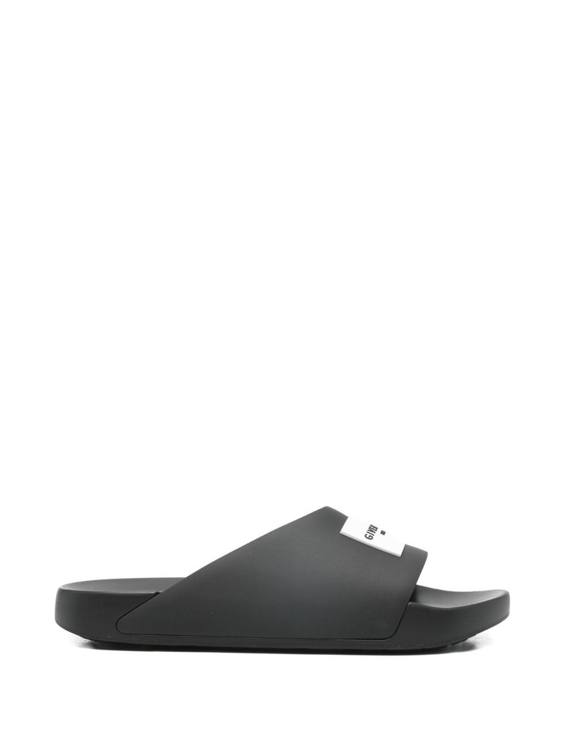 Givenchy Label Slide mules in rubber | Urbalenti™ NYC