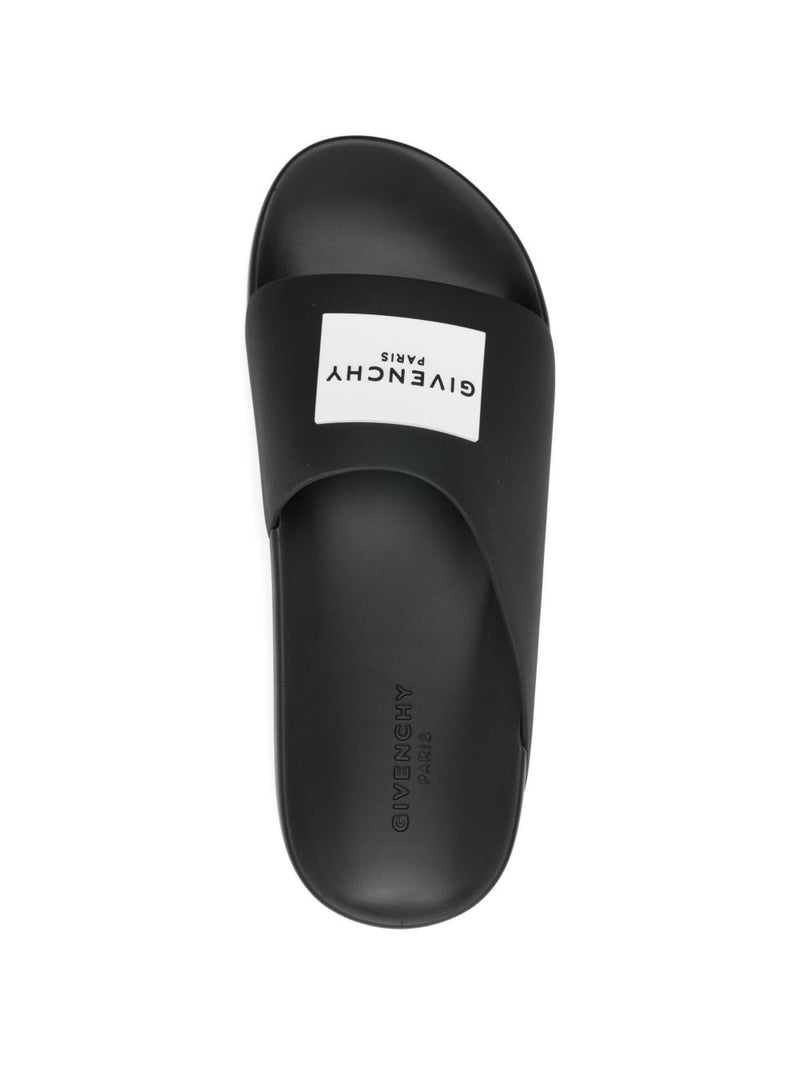 Givenchy Label Slide mules in rubber | Urbalenti™ NYC