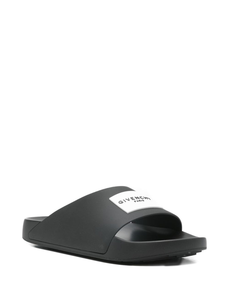 Givenchy Label Slide mules in rubber | Urbalenti™ NYC