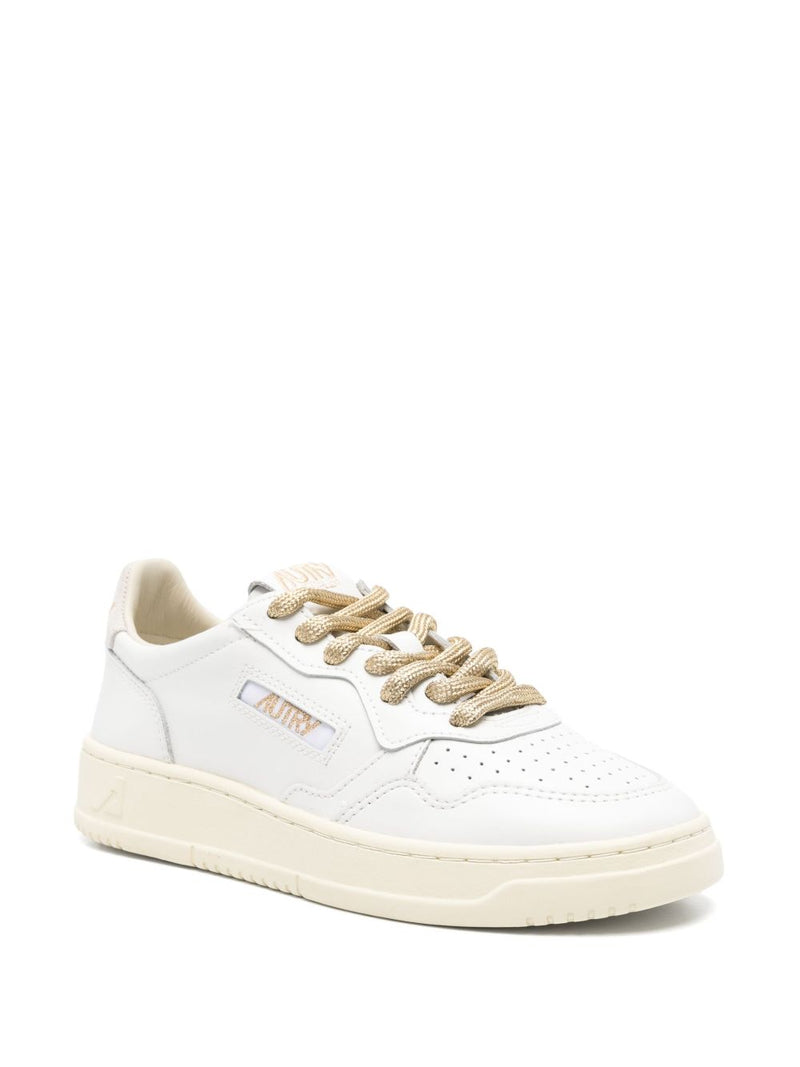 Autry MEDALIST LOW SNEAKERS IN WHITE LEATHER | Urbalenti™ NYC