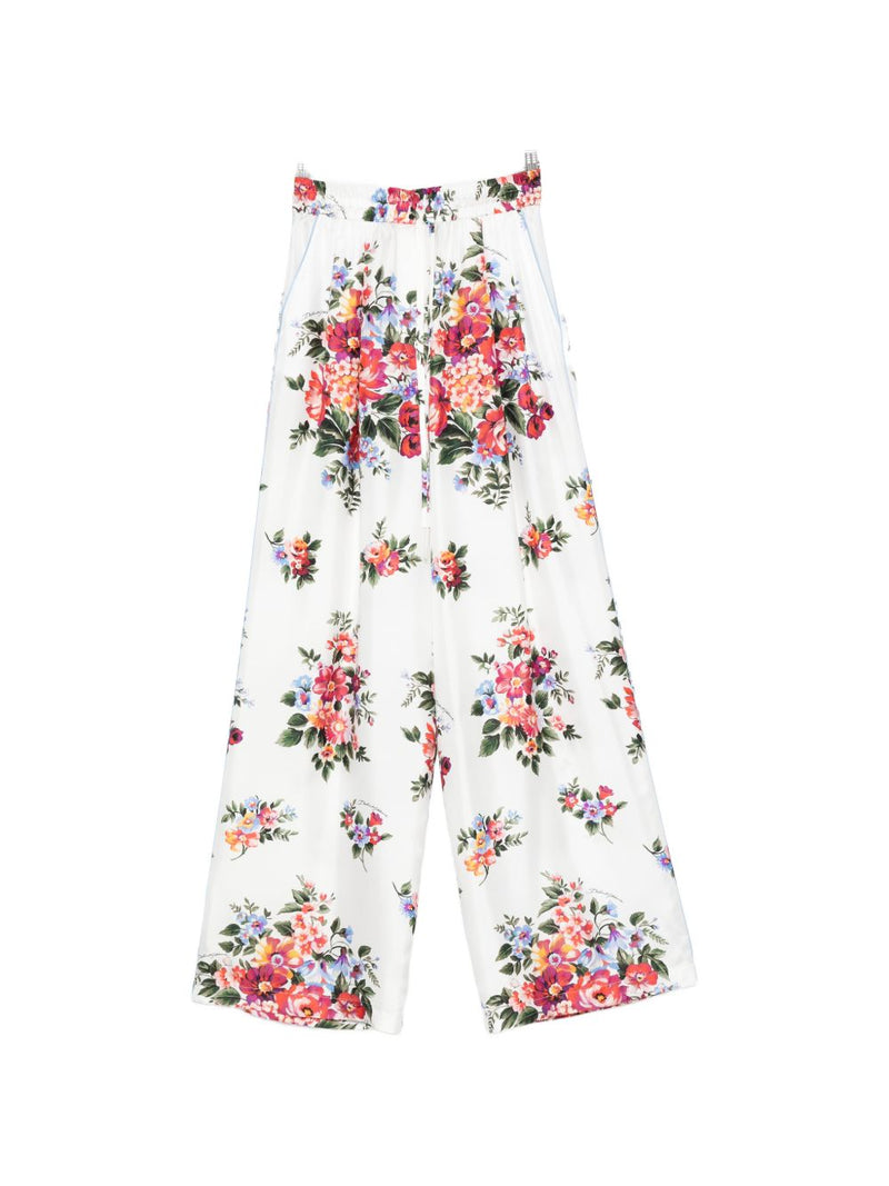 Dolce & Gabbana Flower print silk trousers | Urbalenti™ NYC