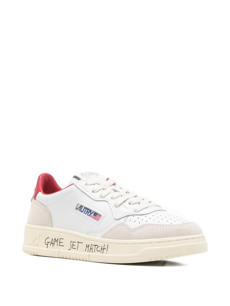 Autry MEDALIST LOW SNEAKERS IN WHITE AND RED LEATHER WITH LETTERING | Urbalenti™ NYC