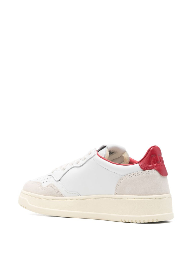 Autry MEDALIST LOW SNEAKERS IN WHITE AND RED LEATHER WITH LETTERING | Urbalenti™ NYC