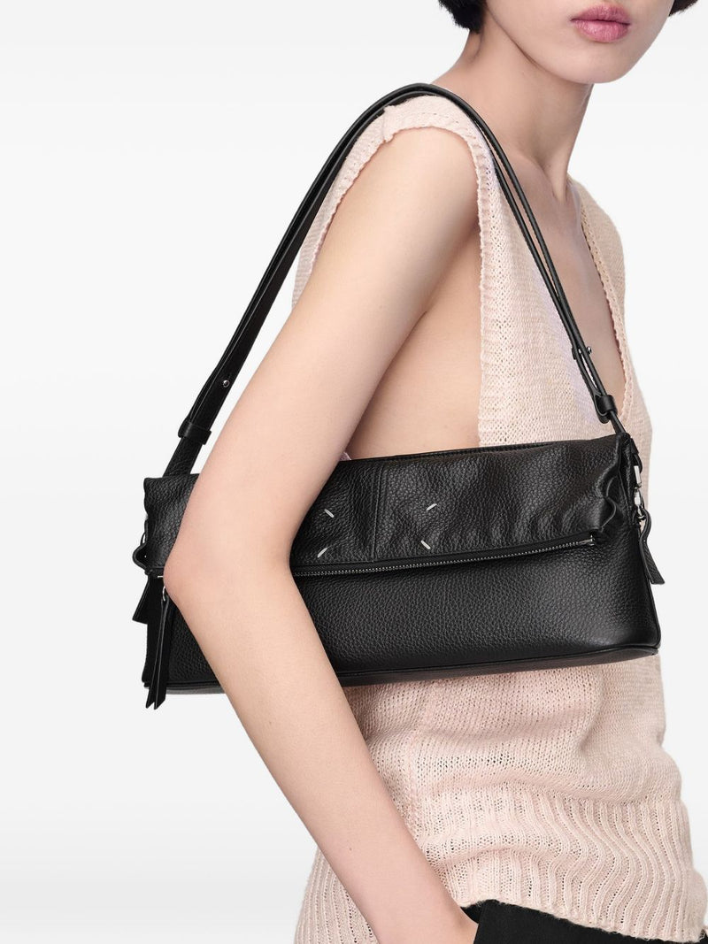 Maison Margiela 5AC leather clutch | Urbalenti™ NYC