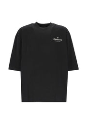 Front view of the 032C Adidas x Willy Chavarria Printed Cotton T-Shirt showcasing a relaxed black design, reflecting modern fashion trends by vendor 032C, ideal for casual wear. This stylish top belongs to the LDin collection for Men, specifically under Men > Clothing and Men > Clothing > Topwear, perfect for Spring - Summer 2026. Yes Eu.