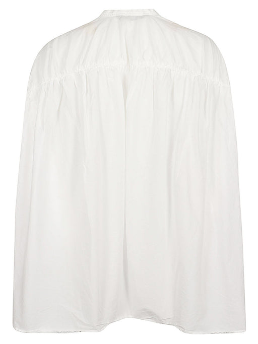 Back view of the 032C Mizuiro Embroidered Cotton Shirt with Stand Collar & Rounded Back Design, highlighting the unique rounded back and intricate gathering detail.
