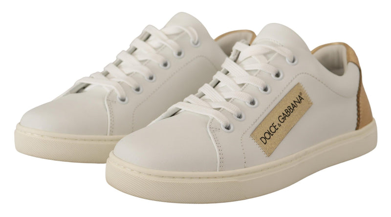 Sneakers basse in pelle bianca e oro Dolce & Gabbana