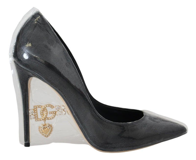 Zapatos de tacón negros de cuero de Dolce & Gabbana envueltos en plástico