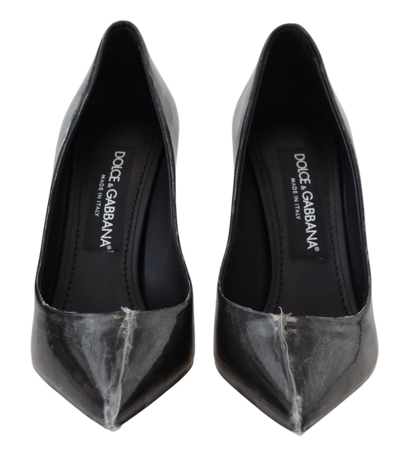 Zapatos de tacón negros de cuero de Dolce & Gabbana envueltos en plástico