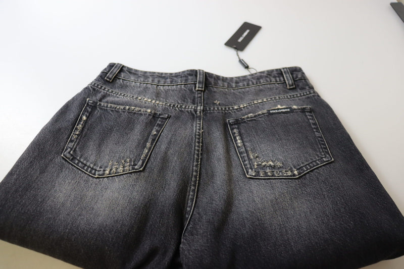 Calça jeans Dolce & Gabbana preta com lavagem desgastada, detalhes puídos e cintura alta