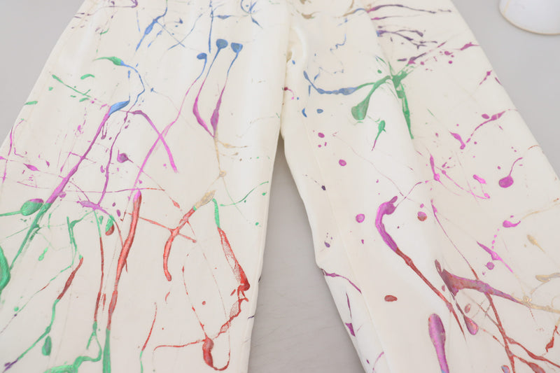 Pantalon en jean en coton blanc à imprimé éclaboussures de couleurs Dolce & Gabbana