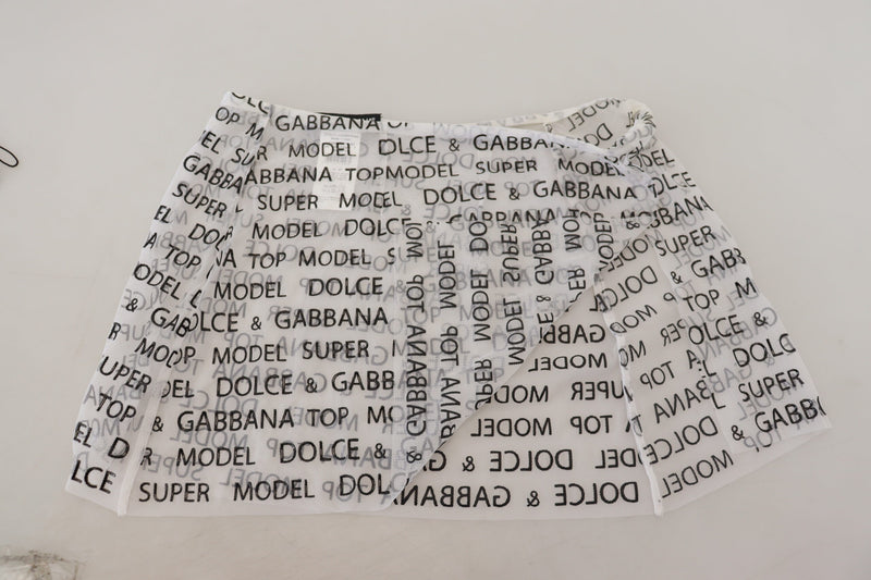 Minifalda blanca de corte A con logotipo y efecto transparente Dolce & Gabbana