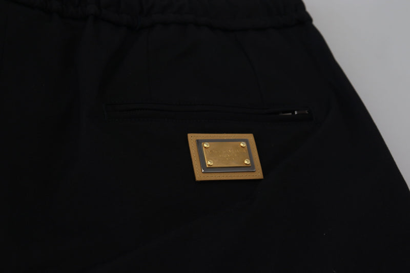 Pantaloni cropped Dolce & Gabbana neri in cotone con vita elasticizzata e logo DG