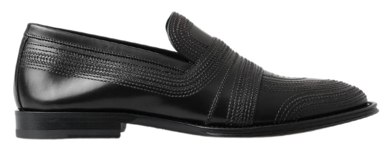 Zapatos Dolce & Gabbana negros de piel, tipo mocasín destalonado, con costuras