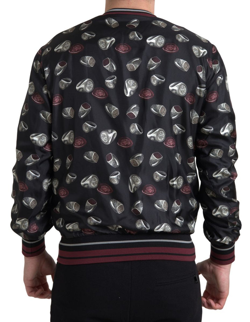Suéter de cuello redondo de seda negra con estampado de anillos de Dolce & Gabbana