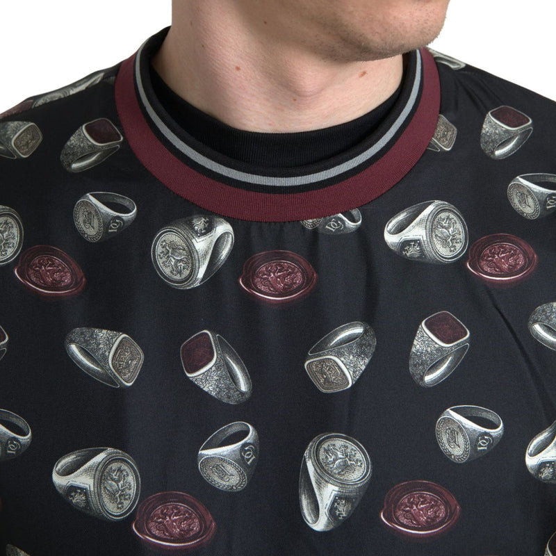 Suéter de cuello redondo de seda negra con estampado de anillos de Dolce & Gabbana