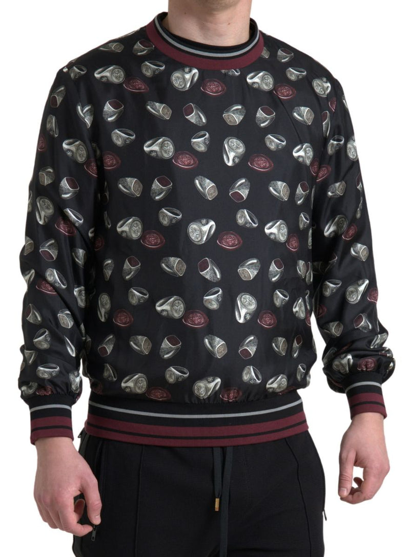 Suéter de cuello redondo de seda negra con estampado de anillos de Dolce & Gabbana