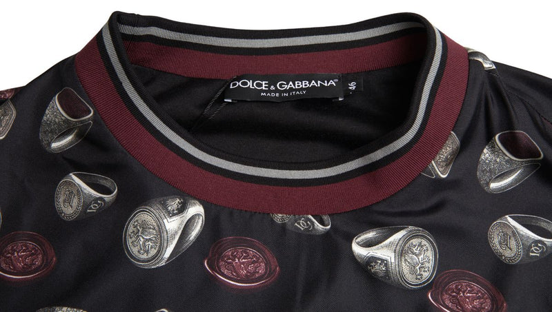 Suéter de cuello redondo de seda negra con estampado de anillos de Dolce & Gabbana