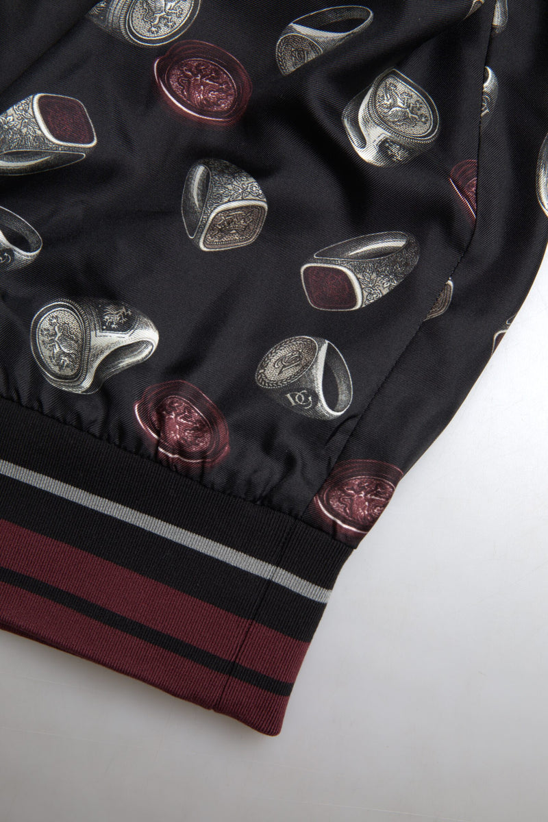 Suéter de cuello redondo de seda negra con estampado de anillos de Dolce & Gabbana