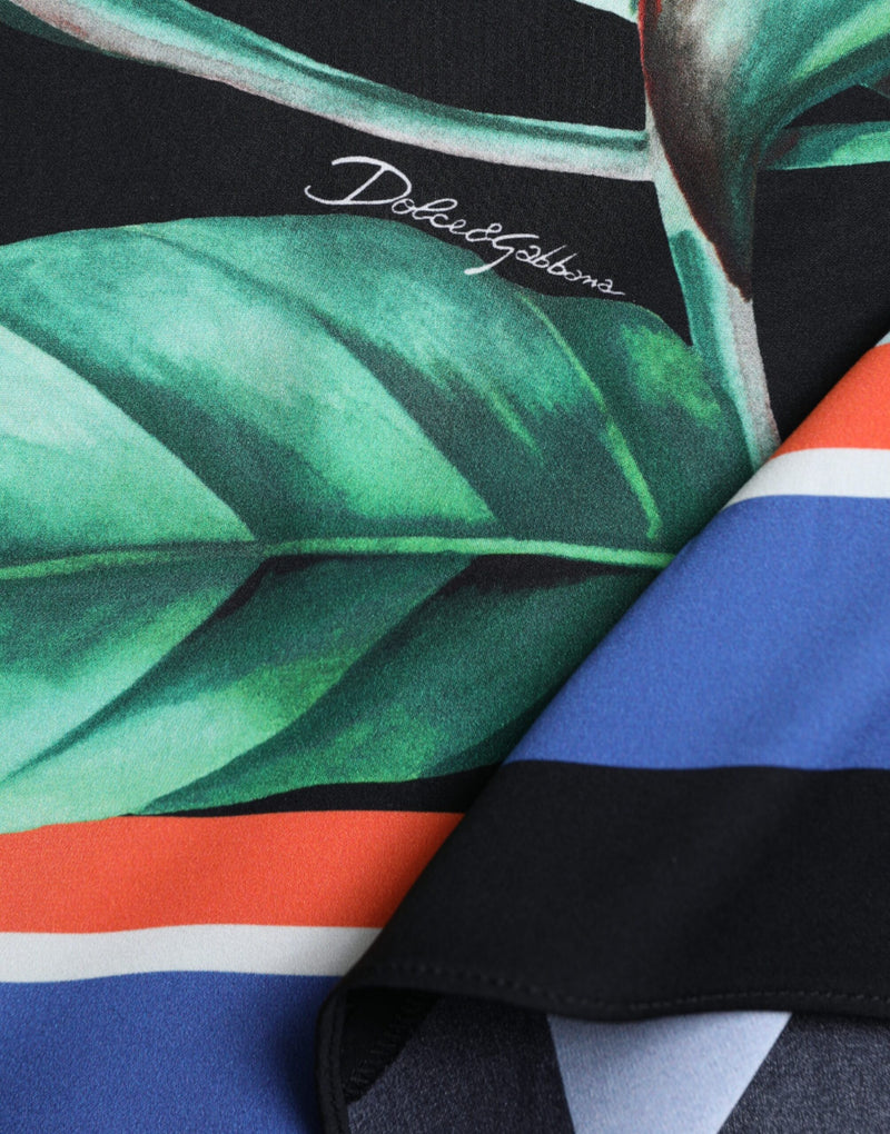 Jupe midi portefeuille Dolce & Gabbana noire à taille haute, motif Strelitzia