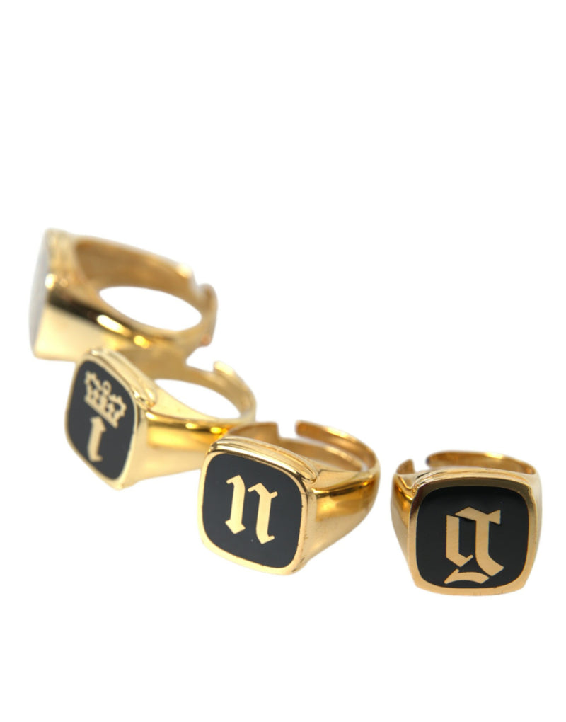 Juego de 4 anillos de latón dorado esmaltados KING de Dolce & Gabbana